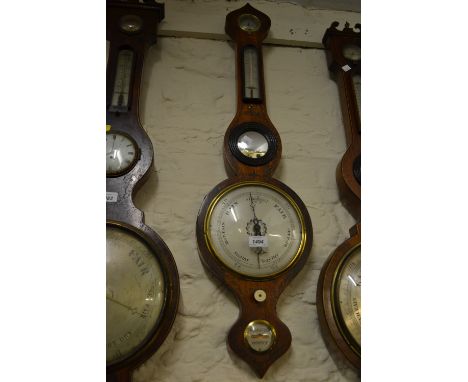 Early 19th Century mahogany wheel barometer with painted decoration and silvered dials