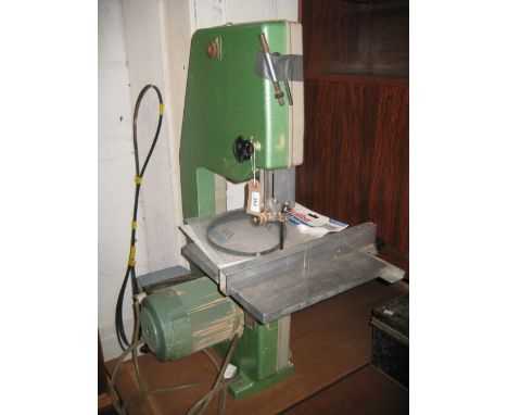 Swiss made Inca Injecta A.G. band saw with packet of spare blades