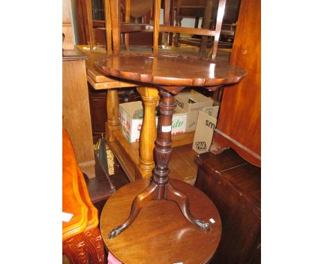 Circular mahogany tilt top pedestal table with tripod base