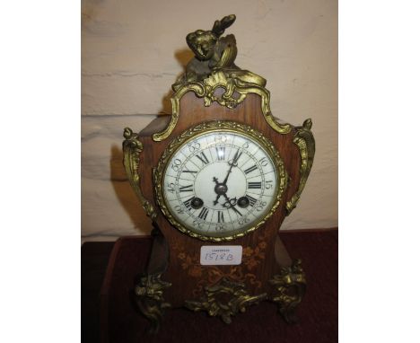 Late 19th or early 20th Century French rosewood and marquetry inlaid mantel clock with enamel dial, Arabic and Roman numerals