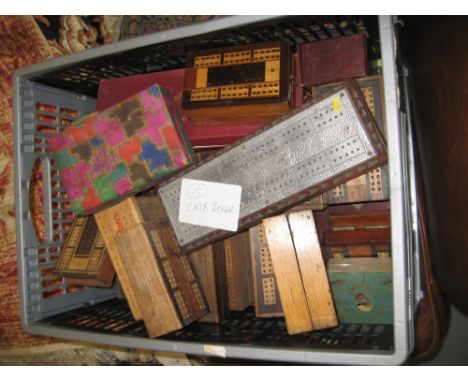 Box containing a quantity of various cribbage boards etc.
