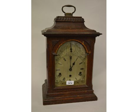 Late 19th or early 20th Century German oak cased bracket clock, the silvered dial with Roman numerals and chime silent select
