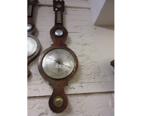George III mahogany and line inlaid wheel barometer thermometer hydrometer with silvered dials, the level inscribed Faglialiu