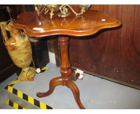 19th Century oval mahogany tripod table on turned column