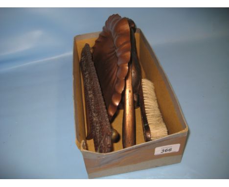 Carved hardwood cribbage board with floral decoration, copper crumb scoop with brush and a coppered metal nutcracker in the f