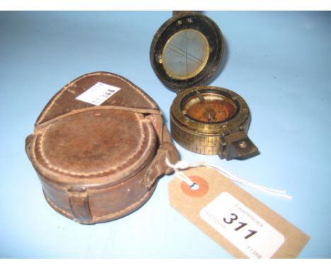 World War I brass and black japanned field compass with arrow mark in leather case