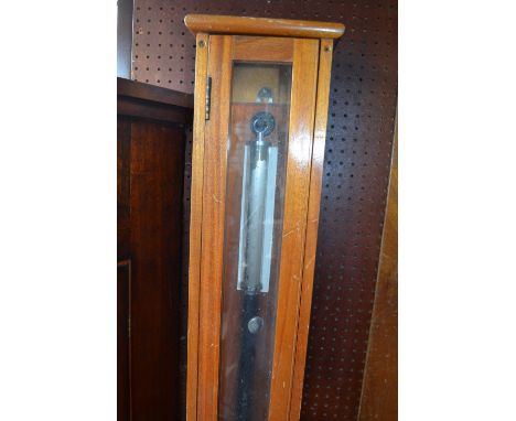 20th Century maritime barometer by F.D. and Co. housed in an oak case