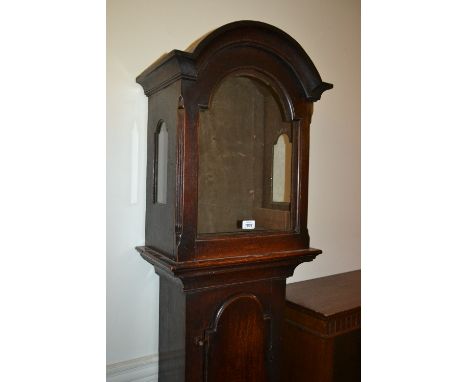 19th Century oak longcase clock case having dome top hood, flush panel door and conforming plinth base