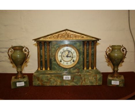 19th / early 20th Century onyx and gilt metal mounted mantel clock having circular dial with Arabic numerals and two train mo