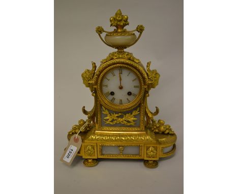 Good quality 19th Century French ormolu and alabaster mounted mantel clock, the broken arch case with fruit and urn surmount,