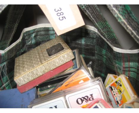 Quantity of various playing cards with shipping related content