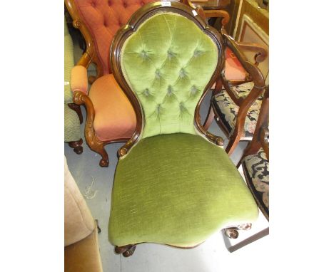 Victorian green button upholstered low seat nursing chair on cabriole front supports