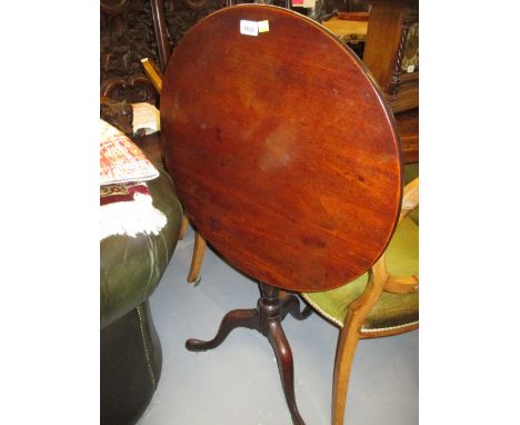 George III mahogany circular tilt top pedestal table on tripod support