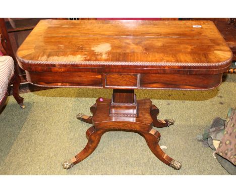 19thC William IV Mahogany fold over card table with beaded rim and splayed legs terminating on brass casters 