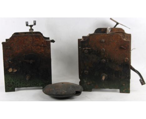 A 19thC iron framed turret clock, of shaped domed top outline, with articulated cogs in two sections, with a heavy pendulum, 