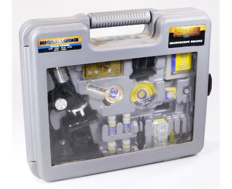 A Micro Science zoom power cased microscope,  41cm wide. (boxed)