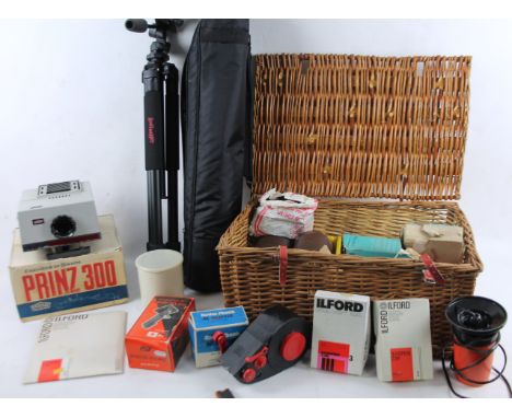 A wicker hamper containing a quantity of various camera equipment, accessories, etc, focus scope enlarger, Ilford and other t