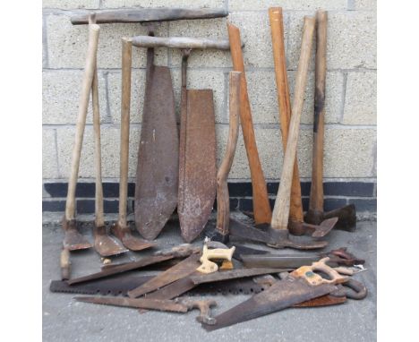 Various early 20thC bygone tools, various pick axes, 92cm wide, etc., tenon and other saws, some named, Baier, etc.  (a quant