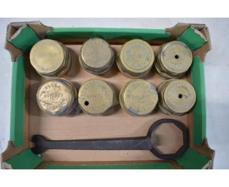 Eight vintage brass carriage wheel nuts to include Allen (Peterboro), W. Rainforth (Lincoln), Wright &amp; Co (Belton), Fred 