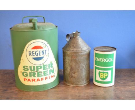 Vintage Regent Super Green Paraffin tin, a can of vintage BP Energol 20W motor oil (unused with contents) and a bare metal co