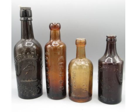 Four antique amber glass bottles, including Globe, Whitbread and Co. London, Robinson and Speight Hull etc. (4) 