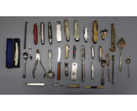 Collection of small pocket knives, cigar cutters, mustard spoons, and a miniature cut throat razor in original box 