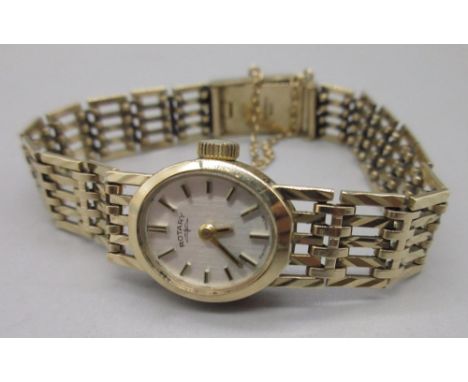 Ladies Rotary 9ct yellow gold wristwatch on five bar gate bracelet, stamped 375, 18.36g 