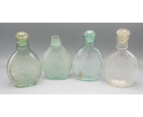 Four clear glass feeding bottles incl. and Son Leeds, 'The Cottage Feeding Bottle' with thermometer, 'The Popular Feeding Bot