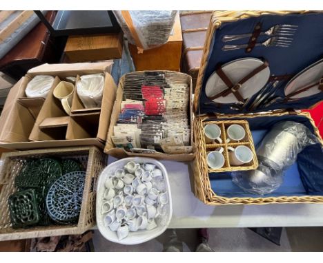 Collection novelty lanyards in original packaging, wicker picnic hamper and contents, metal trivets, three cream Haws jugs, a