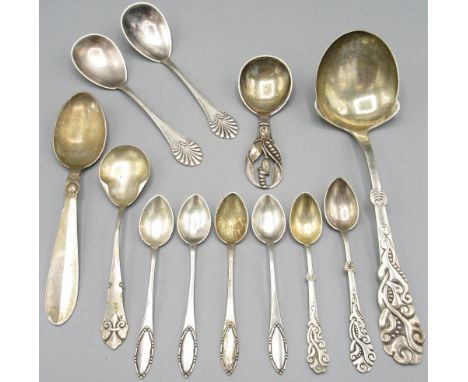 Collection of Danish silver spoons incl caddy spoon with floral handle by Christian F. Heise 1947, set of four teaspoons by C