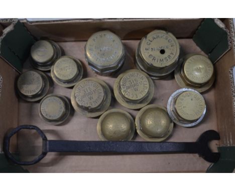 Twelve vintage brass carriage wheel nuts to include 2x Burlington Carriage Co Ltd (315 Oxford Street), Benton &amp; Co (Notti