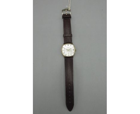 1970's Rotary 9ct gold wristwatch with date, signed silvered sunburst dial, applied baton hours, subsidiary seconds, hallmark