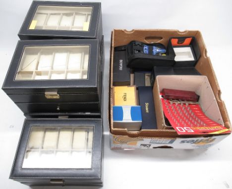 Five black leather finish watch display cases with single drawers to hold twenty watches; W28.5cm; Harrods burgundy leather w