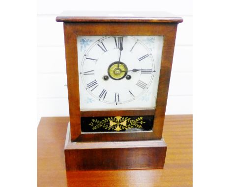 A Jerome & Co, Newhaven USA clock with painted dial and Roman numerals, housed in a stained pine case, complete with pendulum