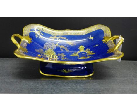 A Carltonware Bleu Royale Pagoda patterned twin handled dish on pedestal base, printed backstamps, 31 x 29cm