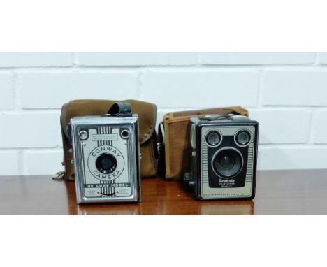 A Conway Deluxe model camera, together with a Kodak box Brownie, each with canvas carry bag (2) 