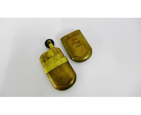 A brass Trench style lighter 