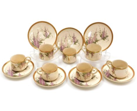 A Japanese early 20thC Satsuma pottery part coffee service, decorated with wisteria, two character mark, comprising seven cup