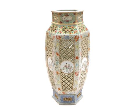 A Qing dynasty late 19thC Chinese famille rose pierced porcelain lantern, of shouldered hexagonal form, with reticulated and 