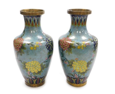 A pair of 20thC Chinese cloisonne enamel vases, decorated with flowers, 32cm high. (AF) 