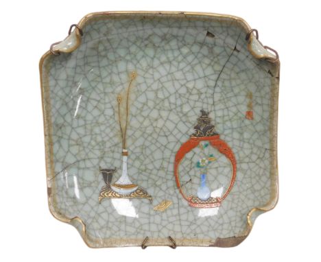 A Japanese crackle glazed dish, of curved, square form, decorated with a vase of peacock feathers on a table, and a jar and c