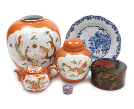A group of Oriental ceramics and collectables, including two orange ground graduated ginger jars, one with lid, decorated wit