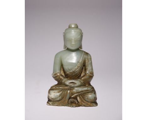A CHINESE CELADON JADE FIGURE OF AMITABHA BUDDHA QING DYNASTY Carved seated in dhyanasana with his hands in dhyana mudra, his