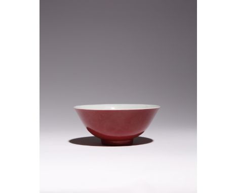 A CHINESE RUBY-ENAMELLED BOWL SIX CHARACTER DAOGUANG MARK AND PROBABLY OF THE PERIOD The flared body rising from a straight f