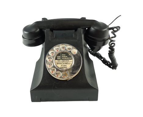 A 1950s/1960s GPO 300 series Bakelite rotary dial telephone