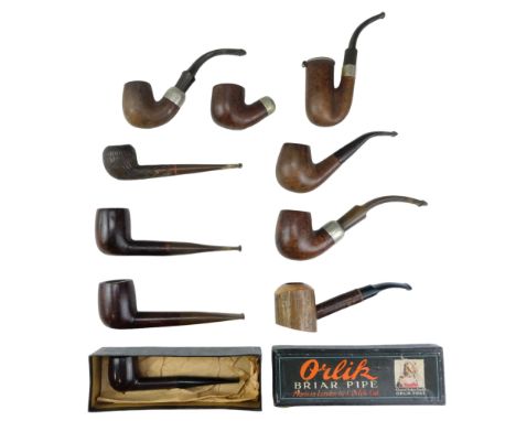 A group of vintage tobacco pipes including two electroplate collared K&amp;P Petersons, an Orlik Briar in original carton, et