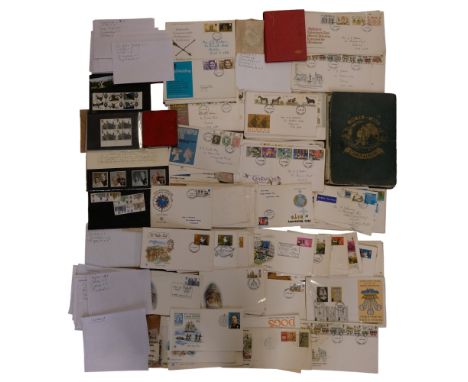 A collection of stamps including an album of largely 20th Century world stamps, Royal Mail mint and unfranked, first day stam