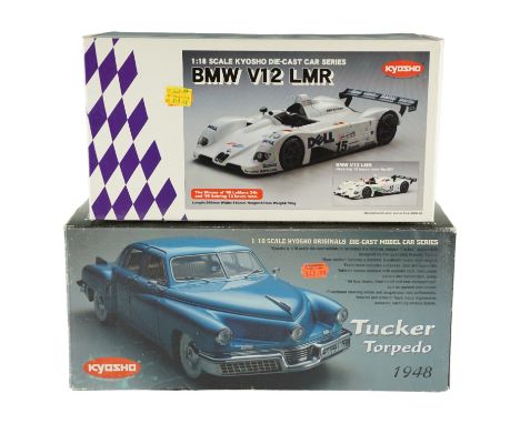 Two Kyosho diecast model cars comprising a BMW V12 LMR and a Tucker Torpedo 1848, 1:18 scale