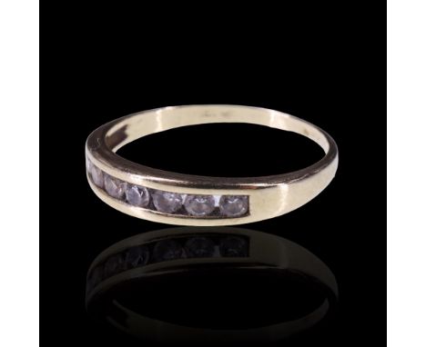 A contemporary channel-set paste and 9 ct yellow metal half-hoop eternity ring, Q/R, 1.6 g