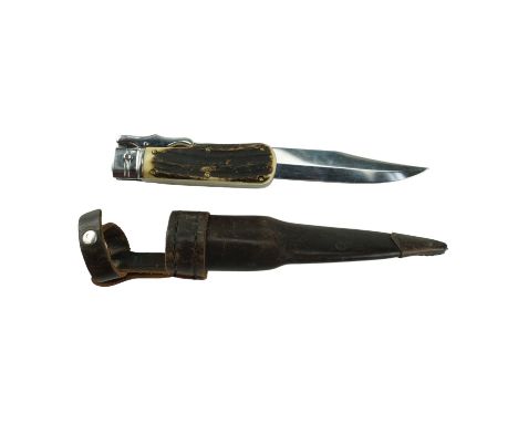 A German Linder Nr 317119 folding hunting knife, having a 19 cm Bowie-type blade and stag antler grip scales, 30.5 cm 